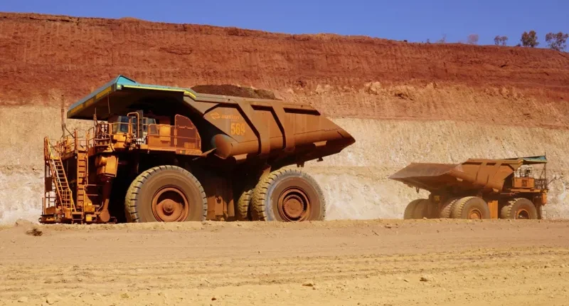 Fifty of these giant driverless trucks work in the Greater Nammuldi iron ore mine