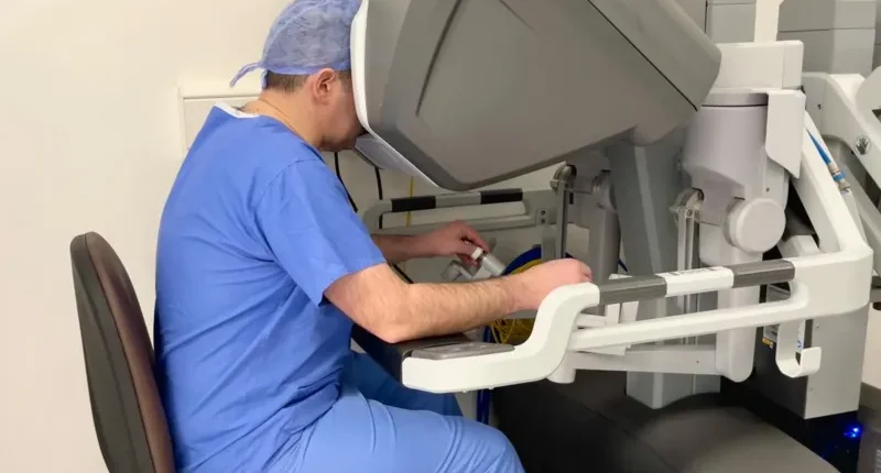 Dr Kevin Burton at his console, performing a hysterectomy with the da Vinci robot