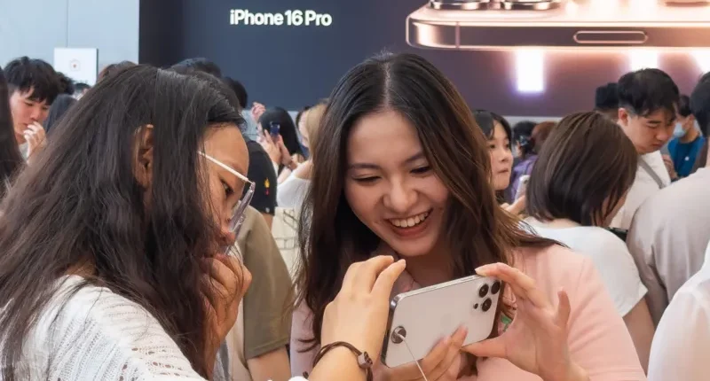 The US tech giant cuts prices in China as it faces growing competition from local rivals
