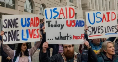 Demonstrators outside the US Agency for International Development (USAID) headquarters in Washington, DC on Monday