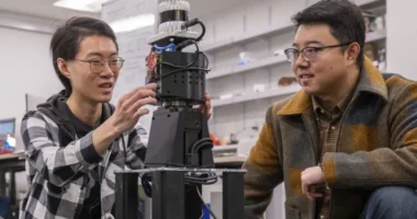 Prof Mingmin Zhao (right) has been working on a radio vision system for robots