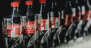 Beverage giant's boss says his company may need to action if aluminium cans become more expensive